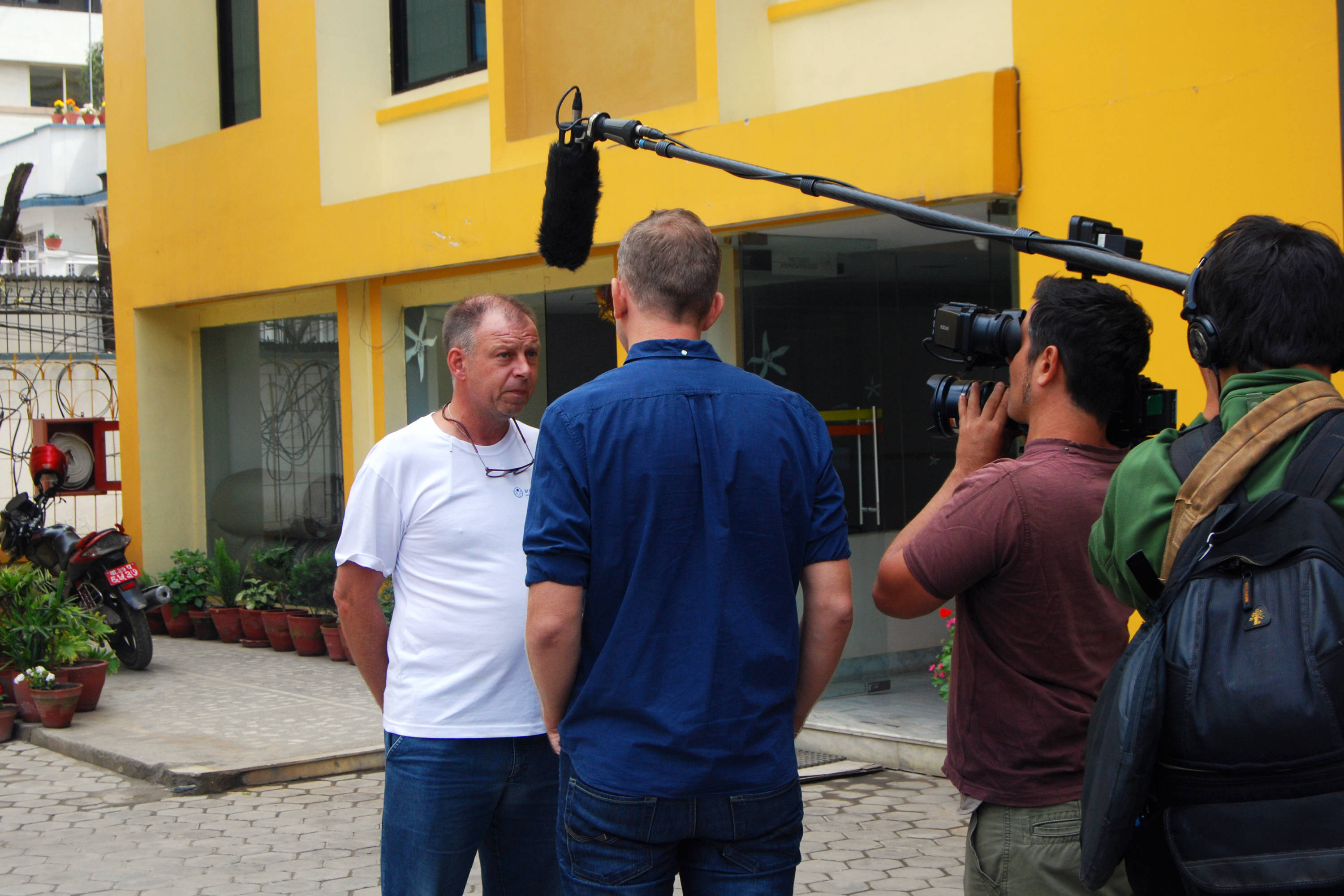arche noVa staff giving interview