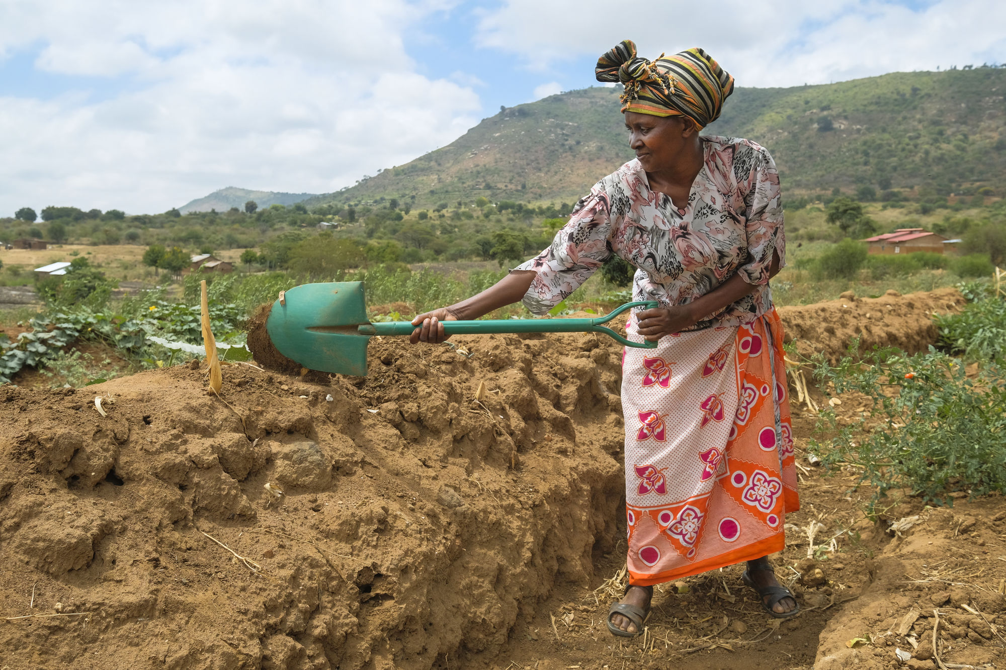 Josephine Nyenze terrazing her farm